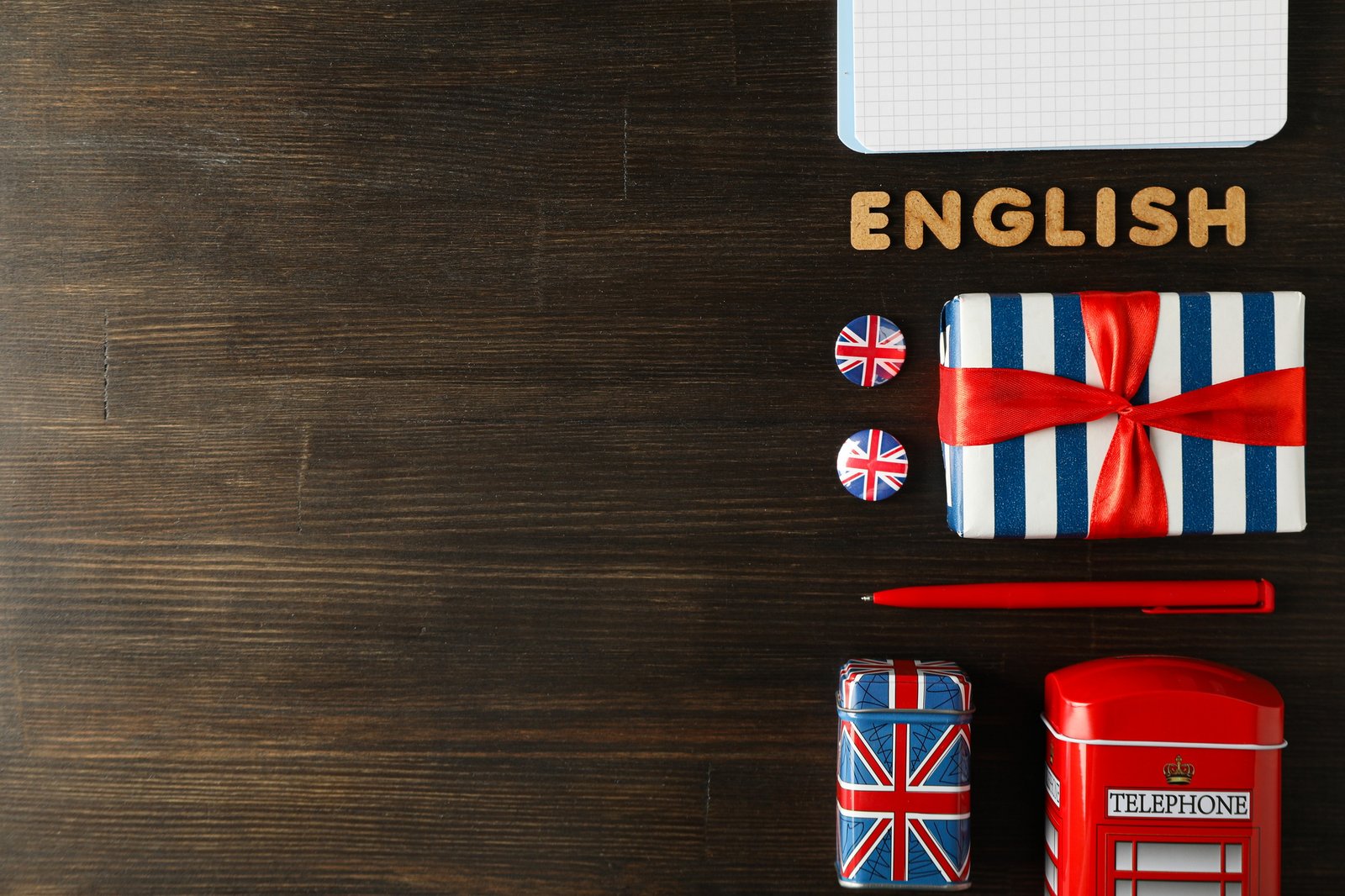 The concept of learning English, a notebook on a blue background.